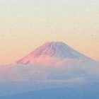 赤みを浴びた富士山の画像